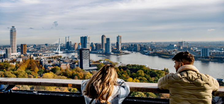 couple overlooking Rotterdam's skyline