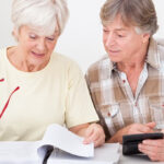older couple looking at super fund returns