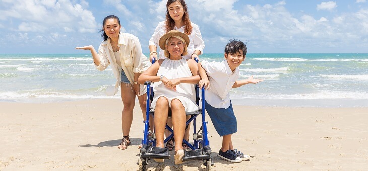 elderly woman with dementia on holiday with family