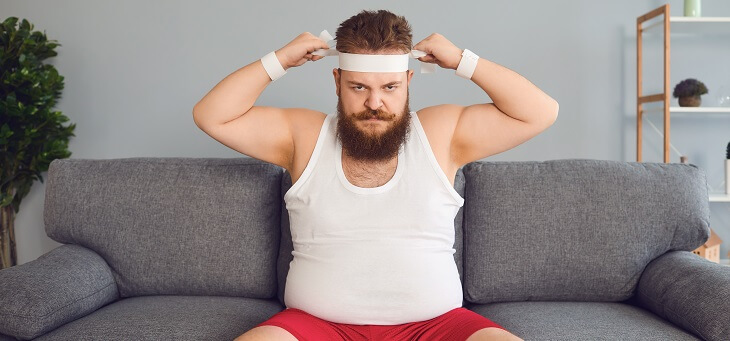 man on couch about to exercise