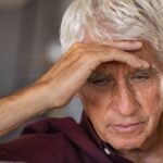 older man suffering from undiagnosed adhd