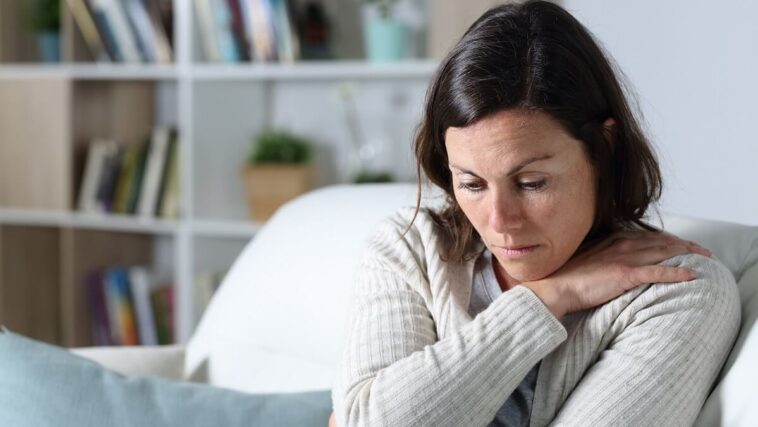 woman suffering menopause symptoms