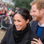 prince harry and megan markle speaking with the public