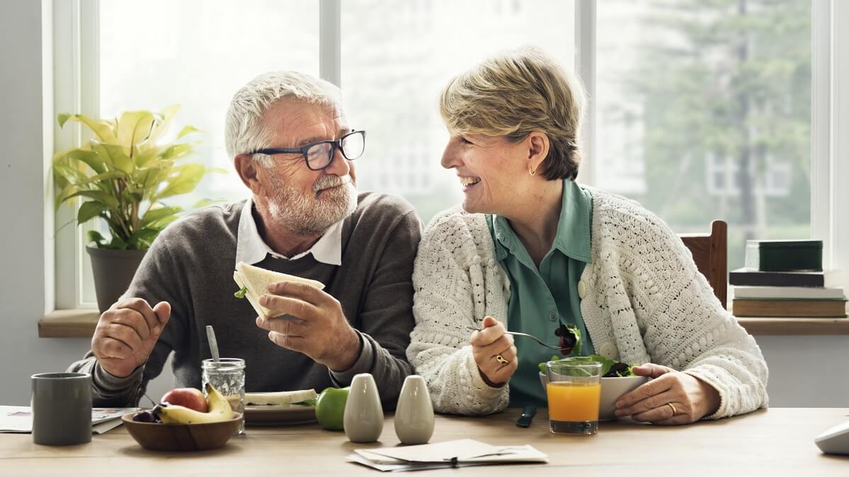 older couple discussing age pension increase