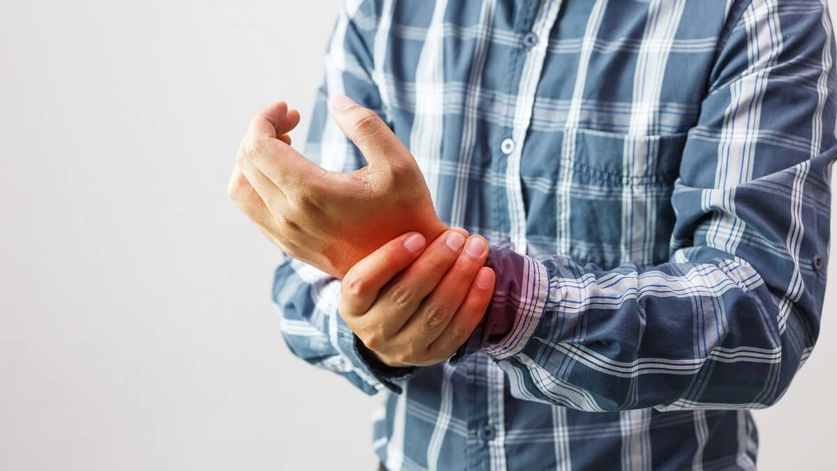 man suffering from rheumatoid arthritis