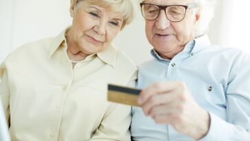 couple looking at the new seniors card