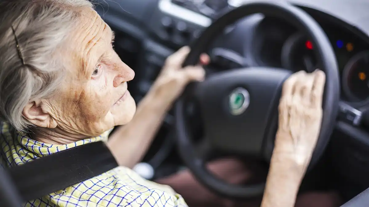 Senior woman driving a car not knowing when she should stop driving