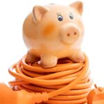 piggy bank on extension lead tips to cut electricity bills