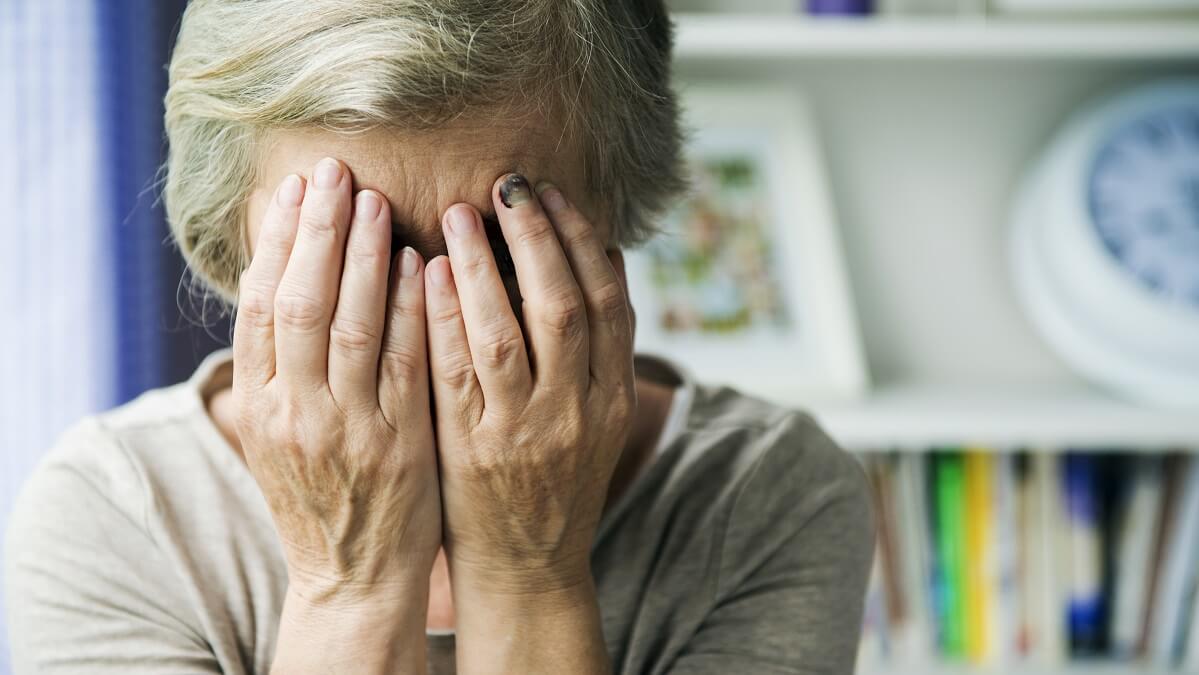woman experiencing financial elder abuse