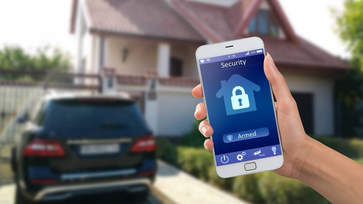 person looking at home security app