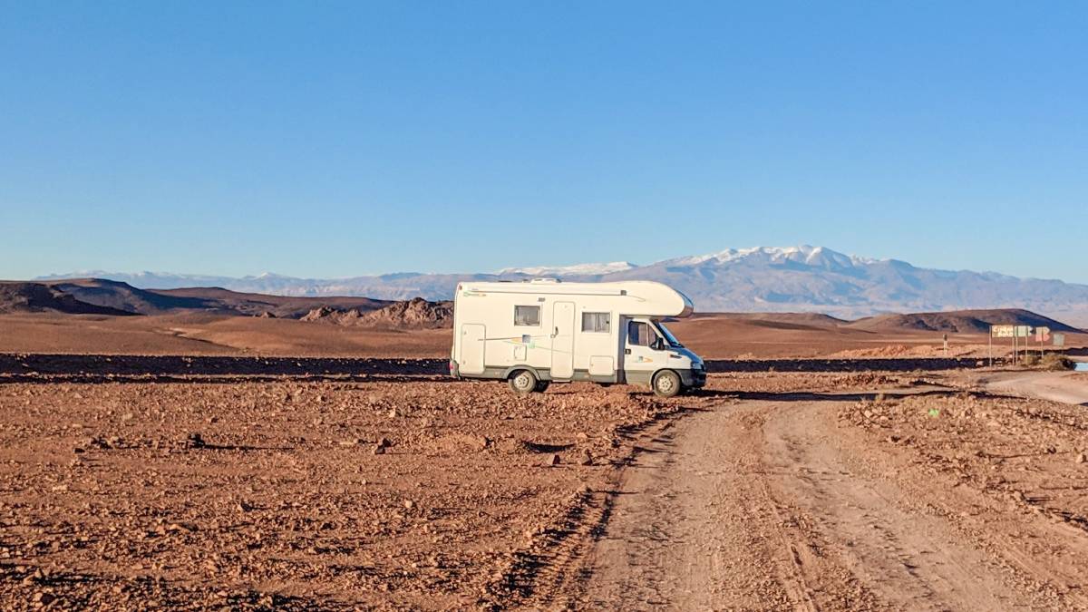 White camper van on dirt roads