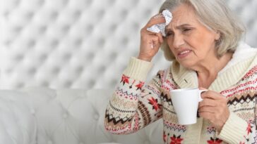 woman suffering flu symptoms