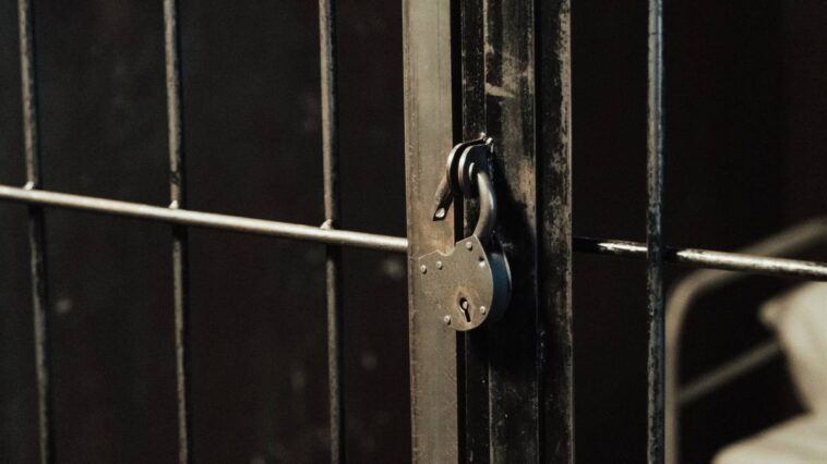 A lock on prison bars