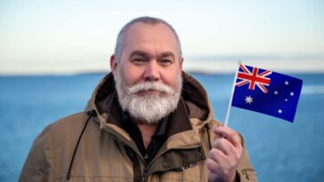 Man holding an Australian flag