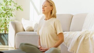 woman doing breathing exercise