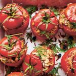 Stuffed tomatoes in a baking dish
