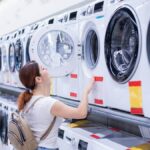 woman choosing a washing machine