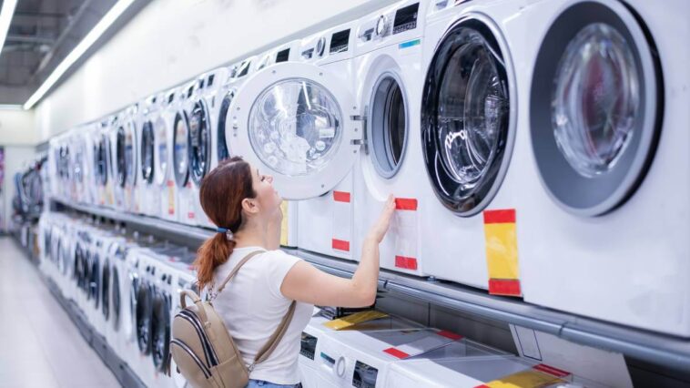woman choosing a washing machine