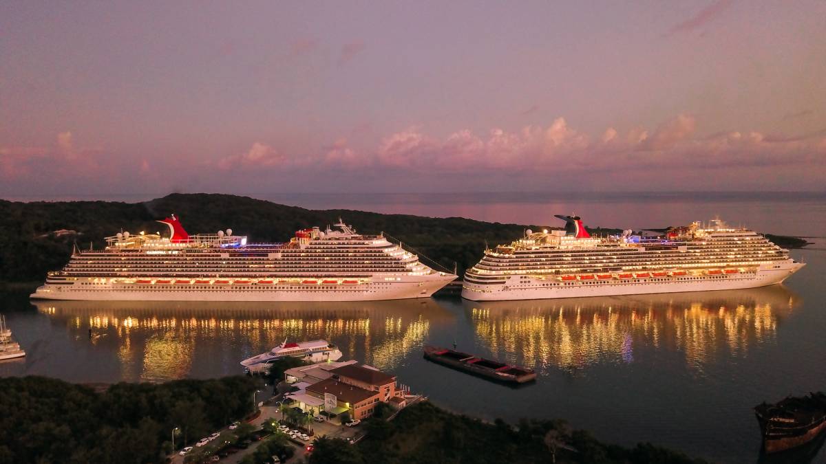 Two cruise ships at night