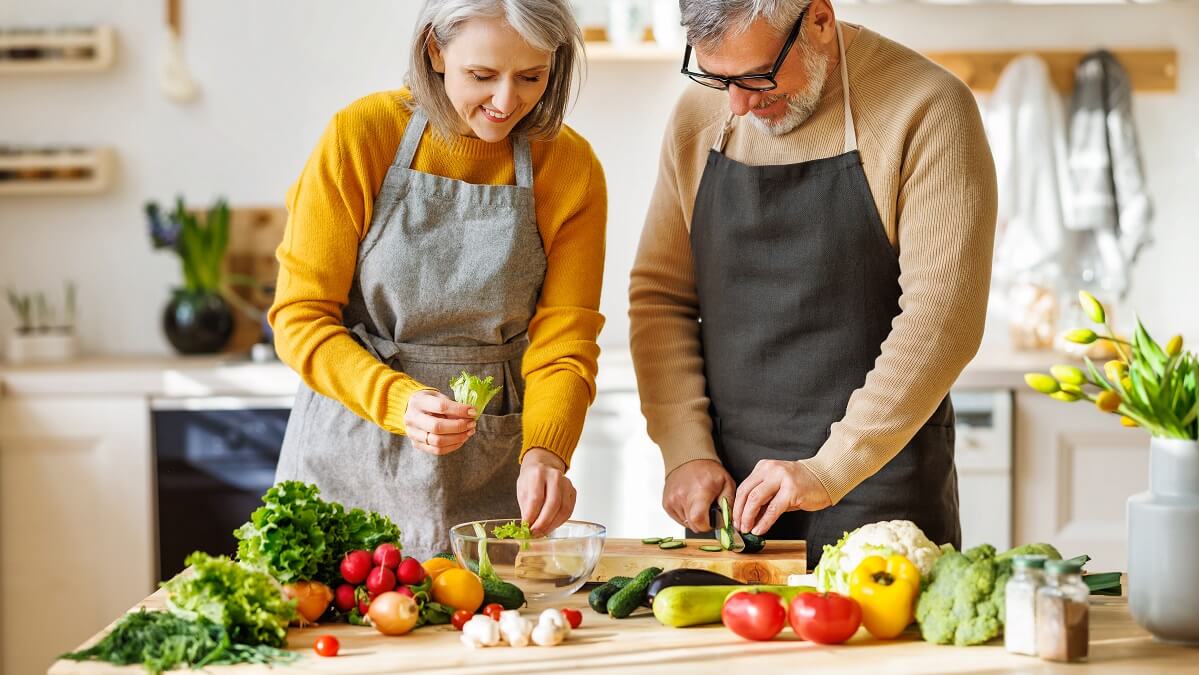 couple preparing vegetables