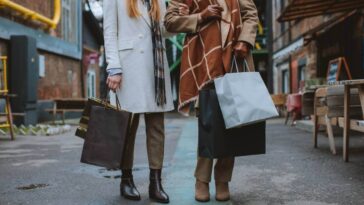Two women holding shopping bags