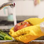 woman practicing food safety at home