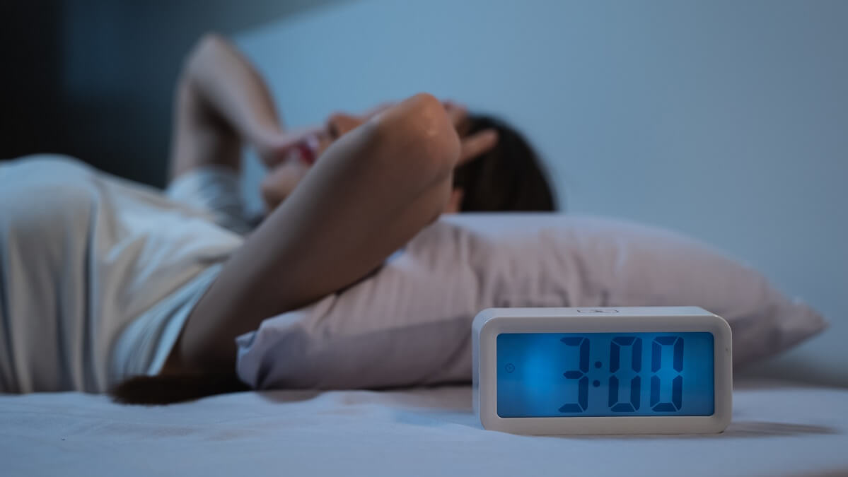 woman struggling to get some sleep