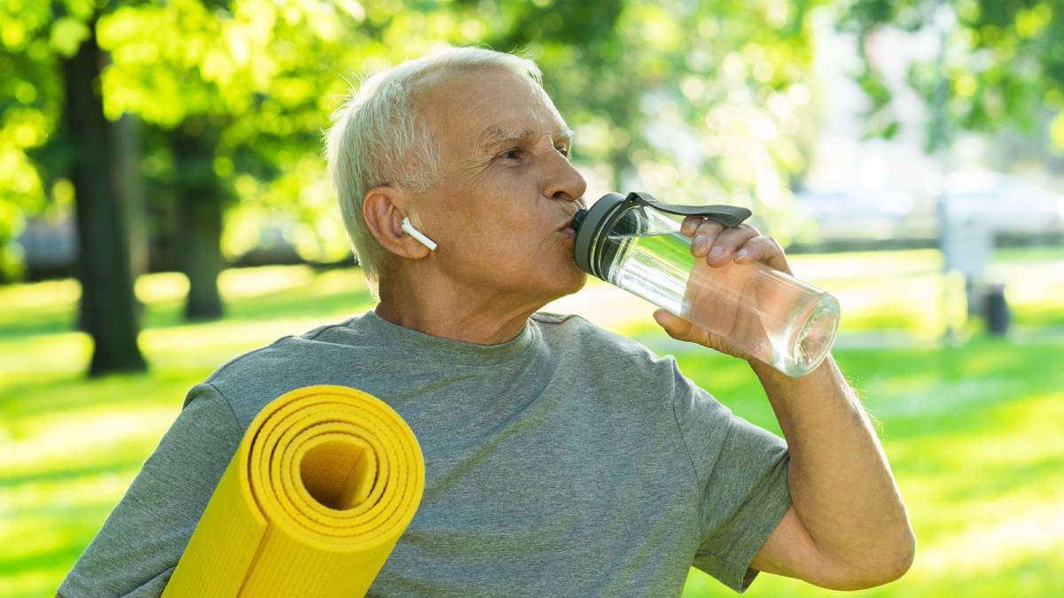 Man drinking from water bottle
