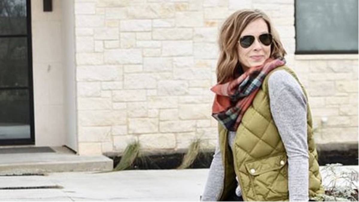 Woman wearing a quilted vest