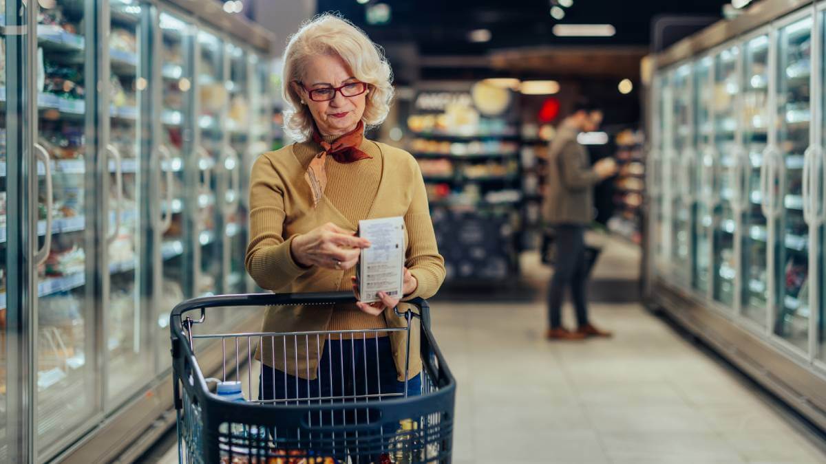 woman checking her supermarket receipt