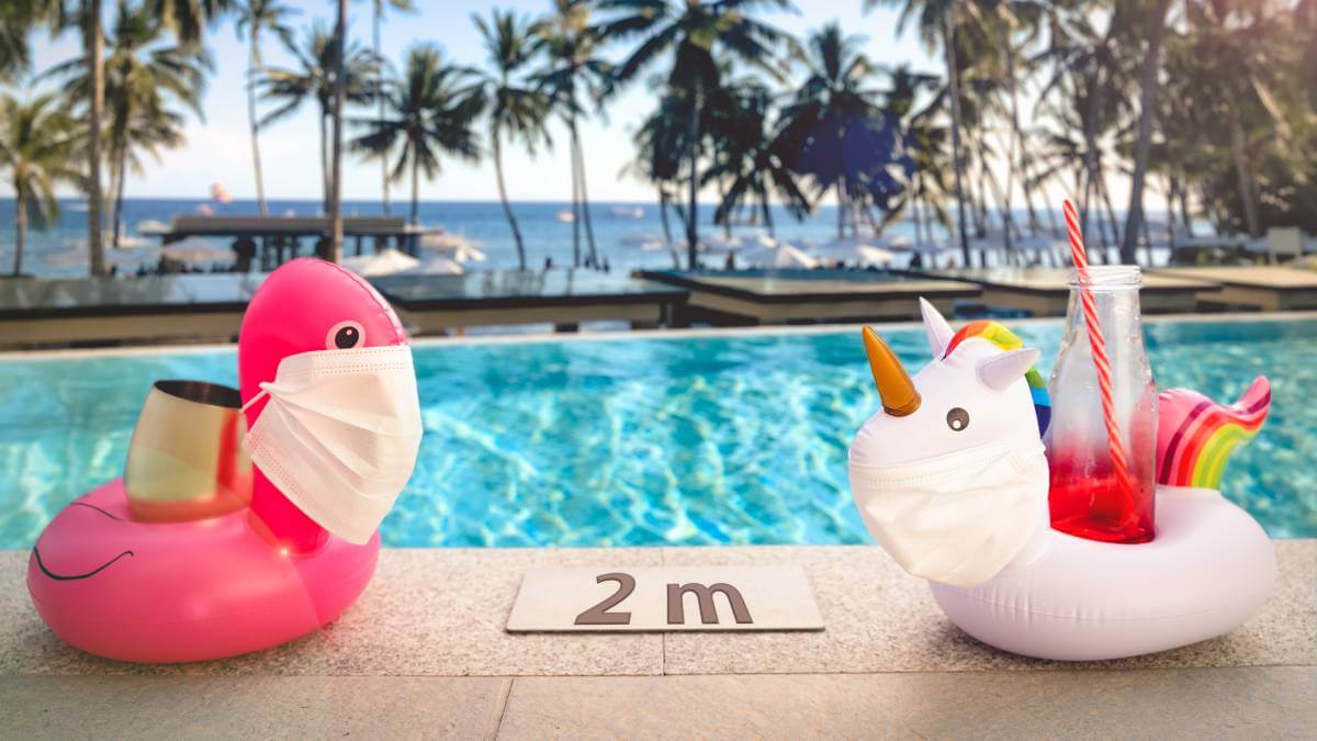 Two pool toys with masks on