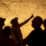travel guide leading group in Egyptian pyramids