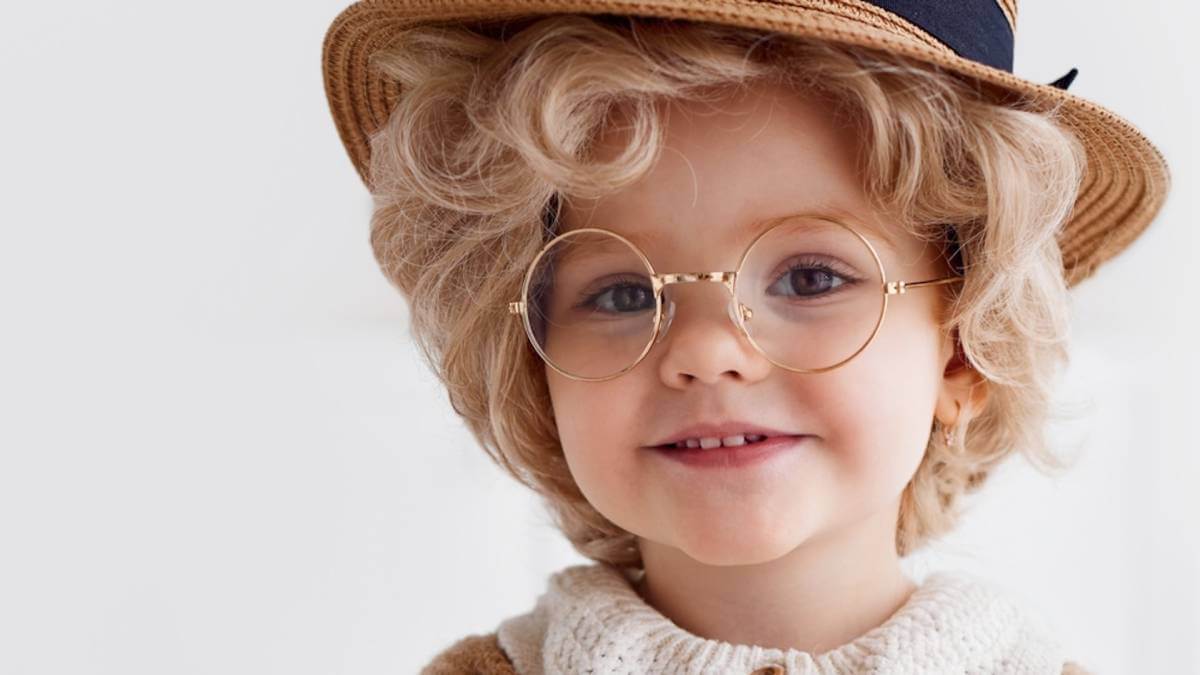 little girl dressed up as grandmother