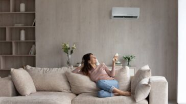 Woman enjoying air conditioning