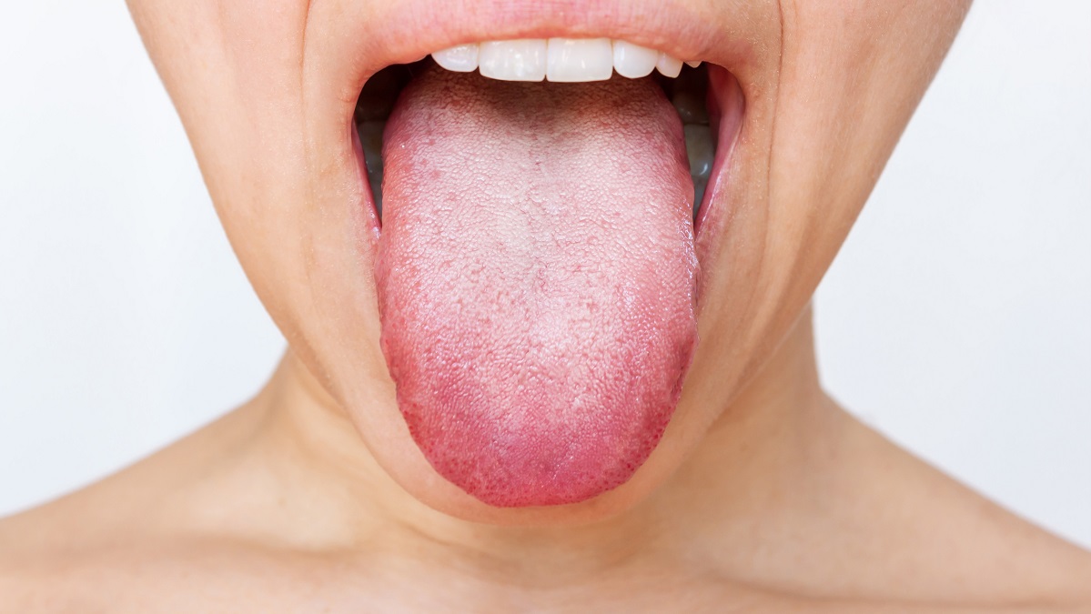 Woman poking out her tongue