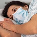 Woman sick in hospital