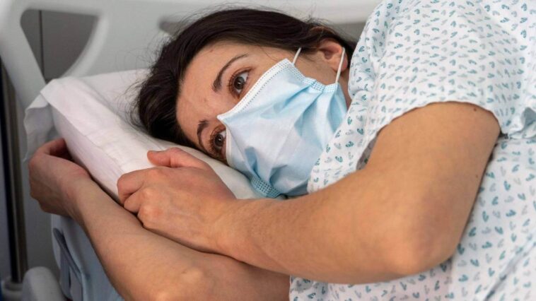 Woman sick in hospital