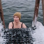 Woman enjoying cold water swimming