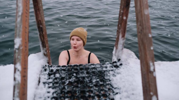 Woman enjoying cold water swimming