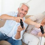 Older couple playing video games