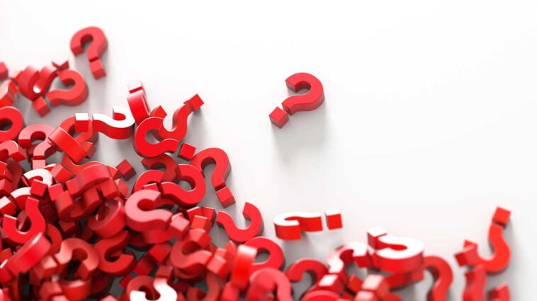 FAQ a pile of red question marks on a white background