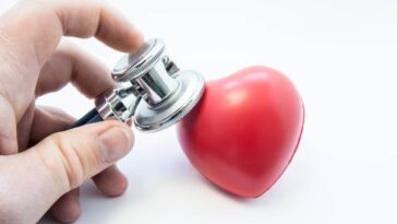 A stethoscope on a toy heart