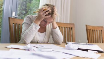 A woman struggling with her tax debt