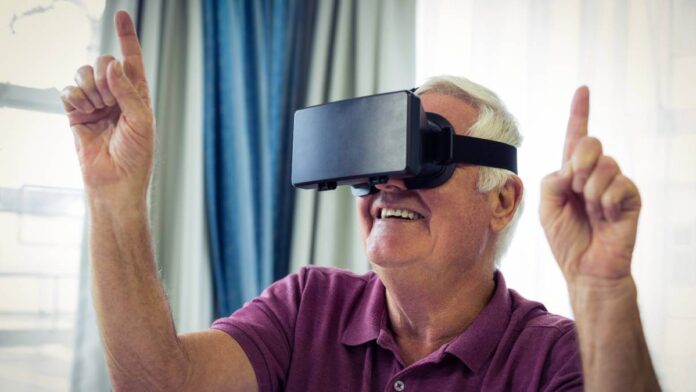 Older man using a virtual reality headset