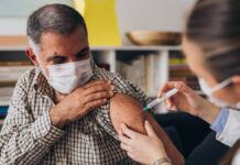 Man getting a vaccine shot
