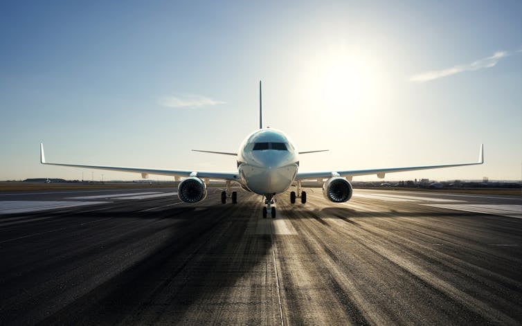 A plane on a runway.