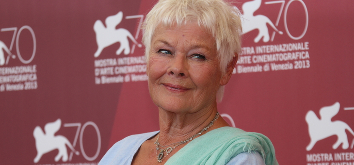 Dame Judi proves the power of the scarf