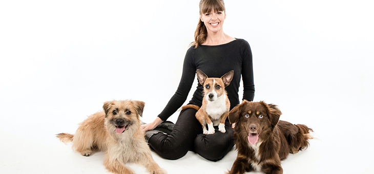 julia stilwell with three dogs