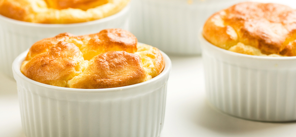Delicious cheese souffle on a white background
