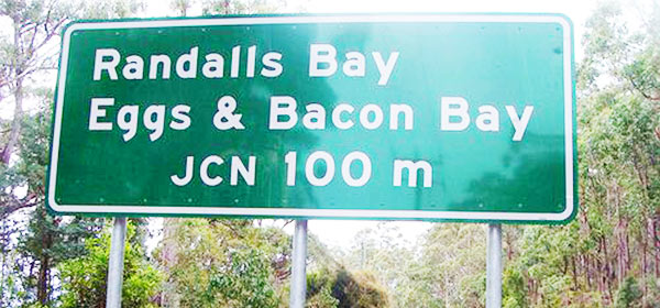 eggs and bacon bay road sign
